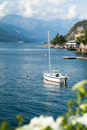 a white boat photographed in Varenna near Lake Como in North Italyの写真素材