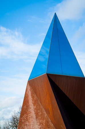 Prague, Czech Republic - January 29, 2015: closeup of a glass pyramid monument photographed in...
