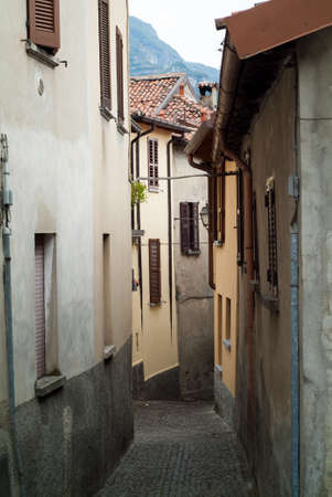 a narrow and quaint street in Northern Italyの写真素材