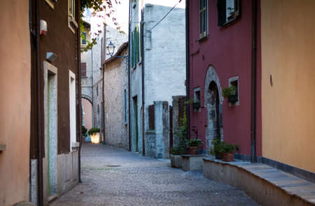 an old atmospheric street in Mandello del Lario near Lake Como, Italyの写真素材
