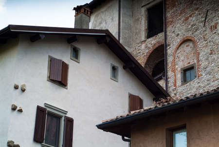 photo of a traditional Italian facades in the town of Bergamo near Lake Comoの写真素材