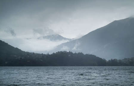photo of Lake Como in Italy on a cloudy eveningの写真素材