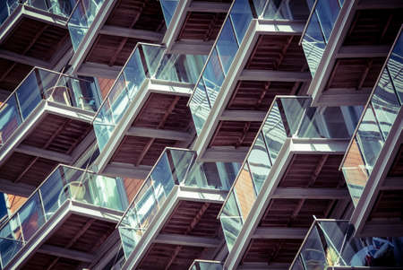 abstract photo of balconies on a block of flats forming a patternの写真素材