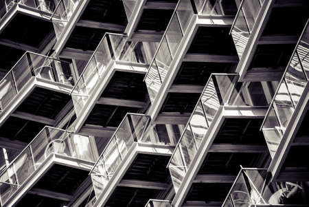abstract photo of balconies on a block of flats forming a patternの写真素材