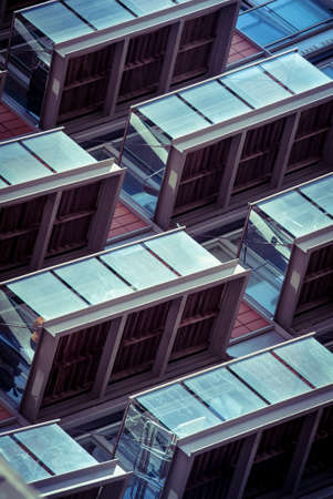 abstract photo of balconies on a block of flats forming a patternの写真素材