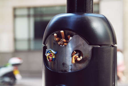 public ashtray on a pole photographed in central Londonの写真素材