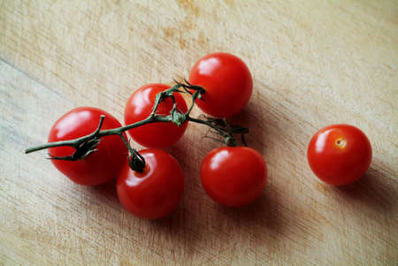 Close-up photo of tomatoes on a vineの写真素材