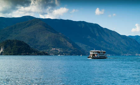 Varenna, Italy - September 4th, 2015: a ferry carries passengers across Lake Como, Italy. Photographed in Varenna on September 4th, 2015.のeditorial素材