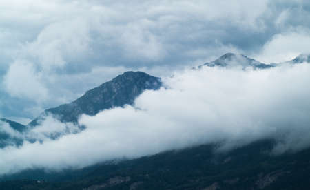photo of mountains near Lake Como in Italy on a cloudy dayの写真素材