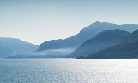 beautiful view of Lake Como on a foggy summer afternoonの写真素材