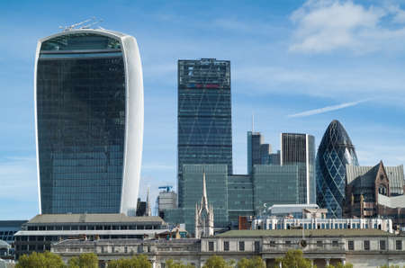 London, UK - May 4th, 2015: photo of the city of London, featuring famous landmarks, such as 30 St Mary Axe (the Gherkin), 20 Fenchurch Street (Walkie-Talkie), and 122 Leadenhall Street (The Cheesegrater).のeditorial素材