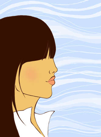 portrait of young woman with long fringe against blue and white backgroundの写真素材