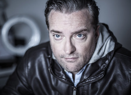 portrait of a handsome man in a leather jacket