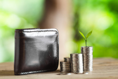 Coin Money Piles Of Coins Trees on the pile of money Economy, Investment And Saving Concept