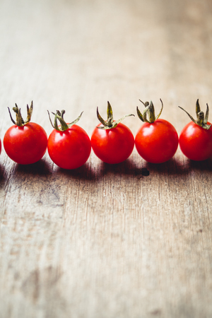 Fresh Tomato cherry in basketの写真素材