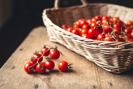 Fresh Tomato cherry in basketの写真素材