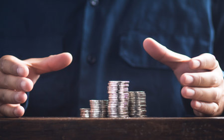 Coin silver money And hand the man in the blue shirt