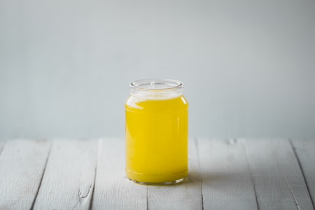 Pineapple juice in a glass bottleの写真素材
