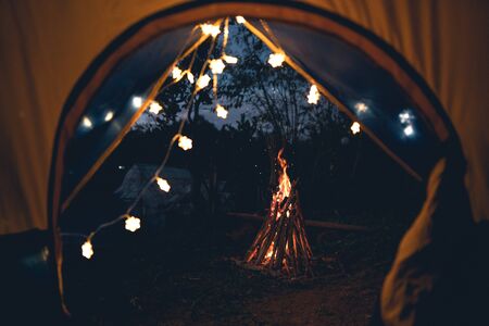 Fire, Camping and tents travel conceptの写真素材