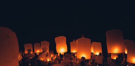 Lighting candles, lanterns in the sky at night in the Lantern Festivalのeditorial素材