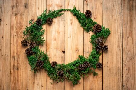 Christmas - Pine cones and branches  On the wood -の写真素材