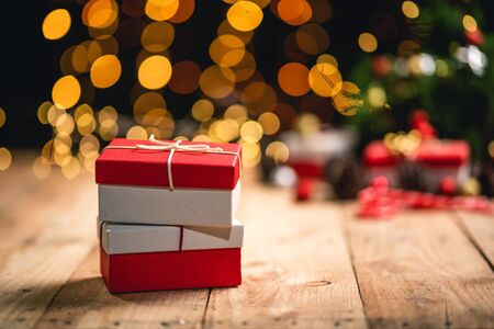 Christmas gift- Pine cones and branches  On the wood-の写真素材