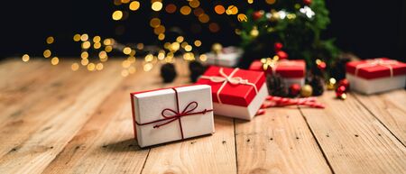 Christmas gift- Pine cones and branches  On the wood-の写真素材