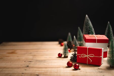 Christmas gift- Pine cones and branches  On the wood-の写真素材