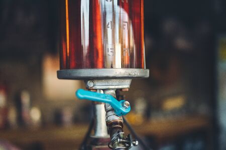 Gas station Opened from a glass jar-の写真素材