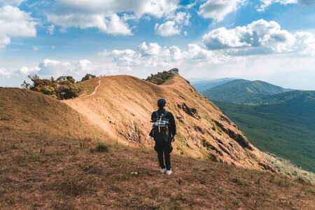 Trekking the backpackers on the golden mountains with bright daytime skies, Mon Jong chiangmaiの写真素材