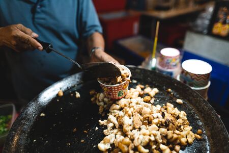 Street food markets in Phuket At night,Squid eggsの写真素材