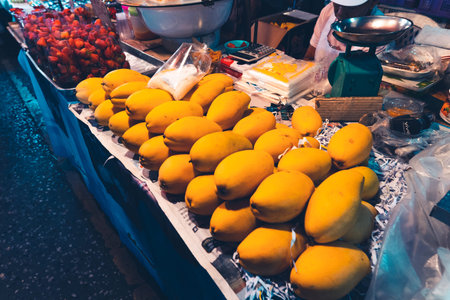 Seafood and fruit on the street nightの写真素材