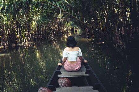 Travel on a wooden boat in the floating market.Bang Bai floating marketの写真素材