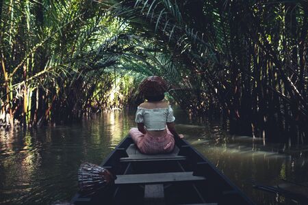 Travel on a wooden boat in the floating market.Bang Bai floating marketの写真素材