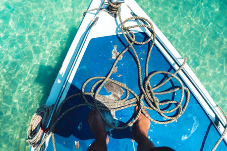 Clear water on the island,Bright blue sea and wooden boat