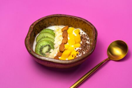 Yoghurt, mixed fruit and cereal In a wooden cupの写真素材