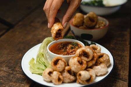 Crispy pork and chili paste and blanched vegetables in a dish,Northern Thai foodの写真素材