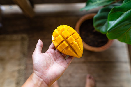 Close-Up Of Mangoes on the leaf In the table