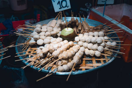 Beer poured into glasses in the barの写真素材