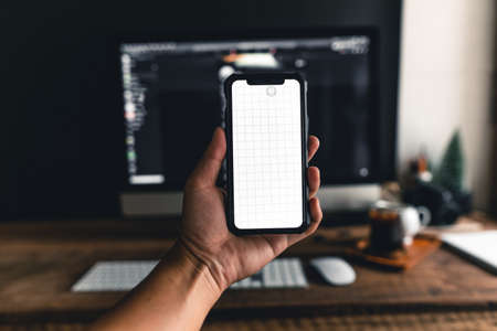 Hold your smartphone at your desk-Front deskの写真素材