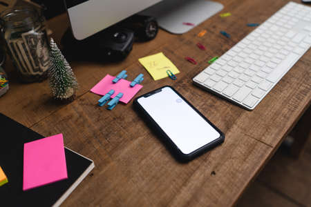 Office desk and computer and stationary equipmentの写真素材