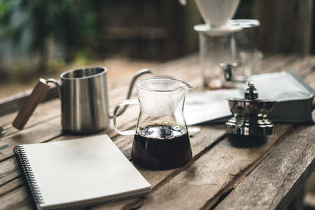 barista dripping coffee and slow coffee bar style drip coffeeの写真素材