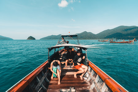 Island tour by long tail boat,Long-tailed boat prow in the blue sea and clear sky.の写真素材