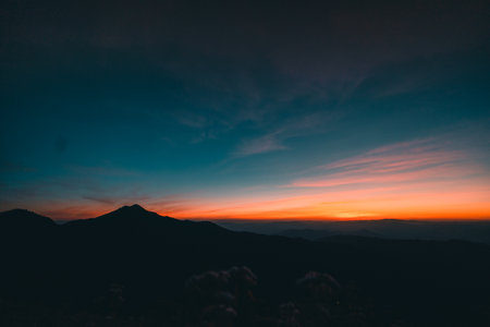 Camping tents and bonfires at nightの写真素材