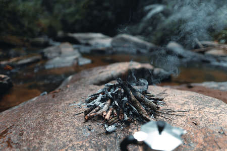 Bonfire,Outdoor at a waterfall in a tropical rainforest,の写真素材