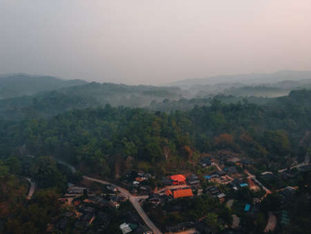 The squares of wood are stacked on top of each other on the workbench.の写真素材