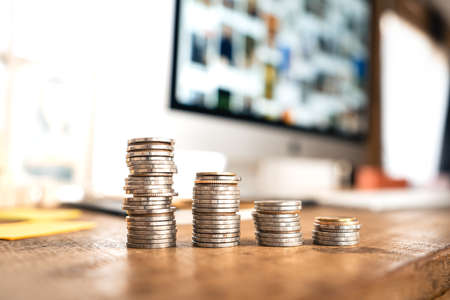 The squares of wood are stacked on top of each other on the workbench.の写真素材
