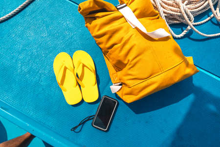 Fishing boats and Villager pier On a tropical island,A fishing boat anchored at the pierの写真素材