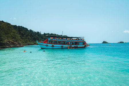 Scenery of tropical island and boat. Sea travelのeditorial素材