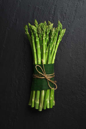 Asparagus from the garden on black backgroundの写真素材